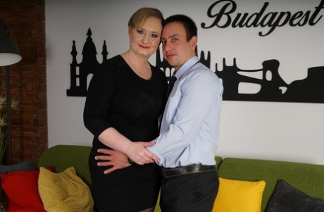 Fat mature with huge saggy tits gets some younger big hard cock doggystyle