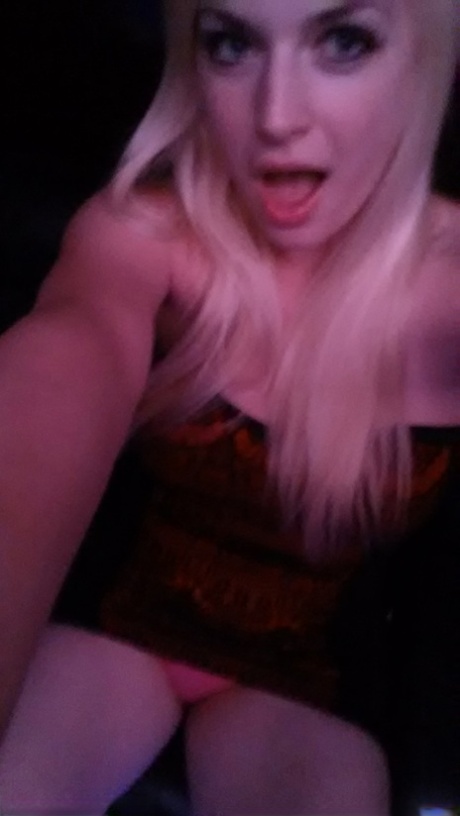 Blonde amateur takes naked and semi-naked selfies in mirrors around the house