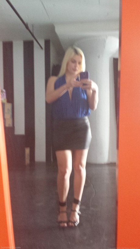 Blonde amateur takes naked and semi-naked selfies in mirrors around the house
