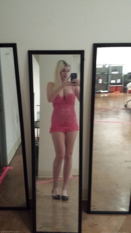 Blonde amateur takes naked and semi-naked selfies in mirrors around the house