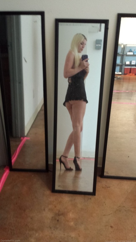 Blonde amateur takes naked and semi-naked selfies in mirrors around the house