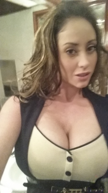 MILF pornstar Eva Notty takes naked self shots while hanging out at home