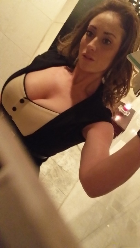 MILF pornstar Eva Notty takes naked self shots while hanging out at home