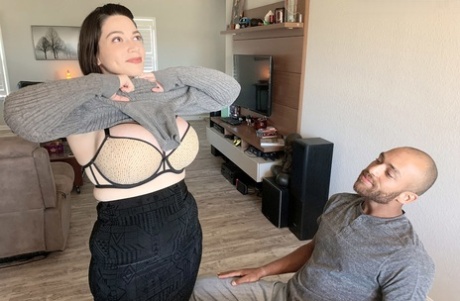 Brooklyn Springvalley frees huge tits from a sweater before sex on a sofa