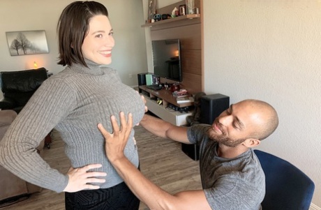 Brooklyn Springvalley frees huge tits from a sweater before sex on a sofa