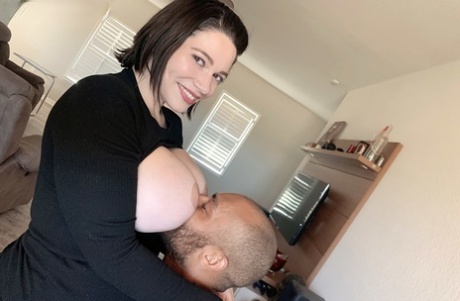 Brooklyn Springvalley frees huge tits from a sweater before sex on a sofa