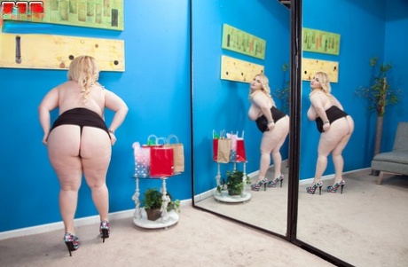 Blonde BBW Nikky Wilder unveils her large boobs and big butt afore a mirror