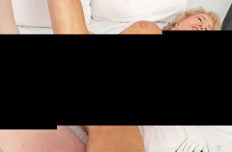 Blonde granny Desiree Eden has sexual intercourse with a young lad
