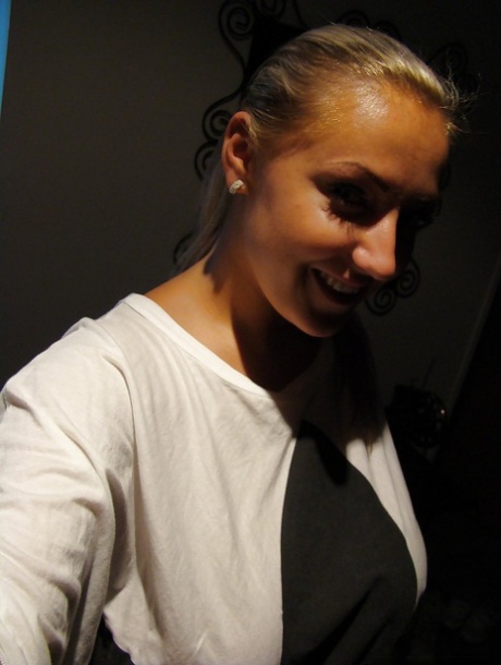 Teen solo girl Krystal taking selfshots of huge natural breasts