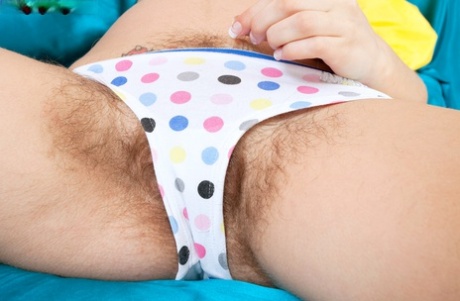 Amateur female Tatiana parts the labia lips of her beaver wide open