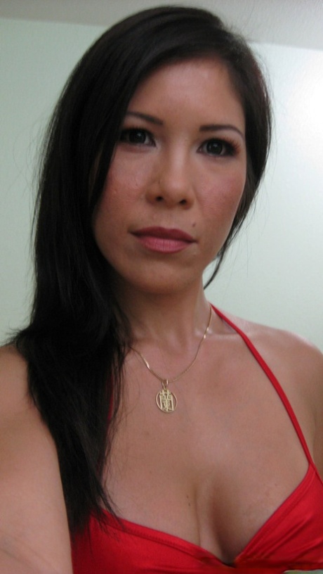 Asian female Lisa Ly takes topless selfies in bathroom mirror