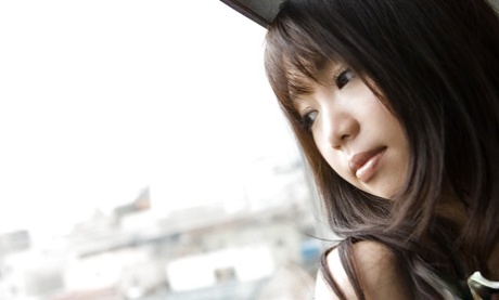 Busty asian babe on high heels Mai Nadasaka stripping off her clothes