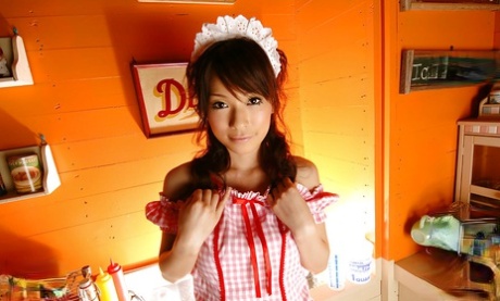 Cuddly asian teen Kaho Kasumi slowly uncovering her tempting curves