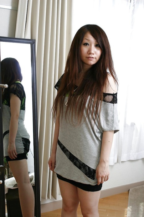 Shy asian babe Rie Noguchi slowly uncovering her tempting curves
