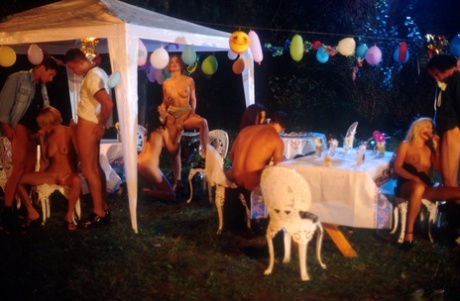 Kinky European pornstars enjoy a hardcore orgy in the back yard