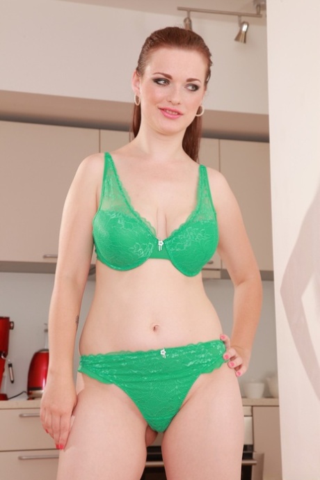 Delicious cutie loses her bikini and spreads her legs on the chair