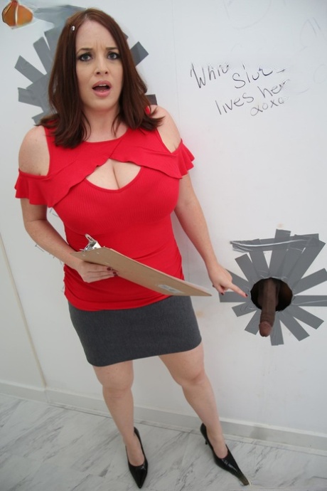 Horny cougar Maggie Green shows her big boobs and sucks a gloryhole BBC