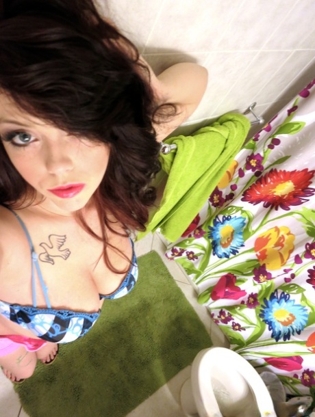 Alluring brunette teen takes selfies of natural big tits before POV titty fuck