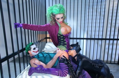 Big boobed cosplay sluts Dylan Ryder and Gemma Massey share a Joker's dick