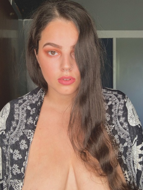 Brunette babe with huge saggy tits Jordyn Khaled reveals her big butt