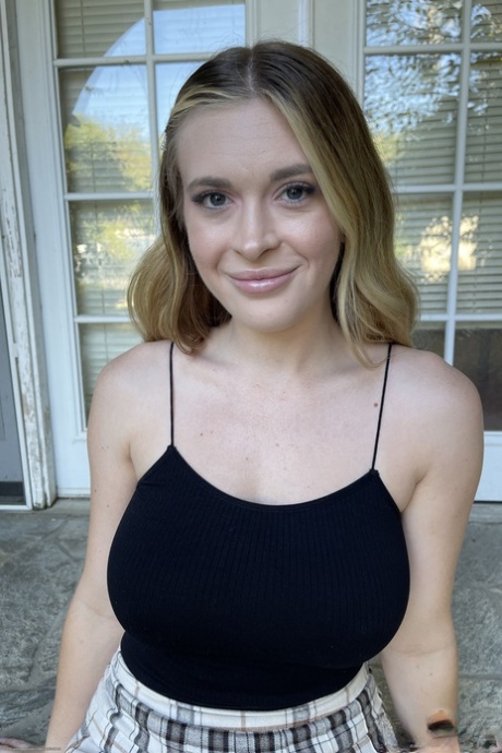 Amateur teen Lindsay Lee lets out her beautiful big tits and flaunts her twat