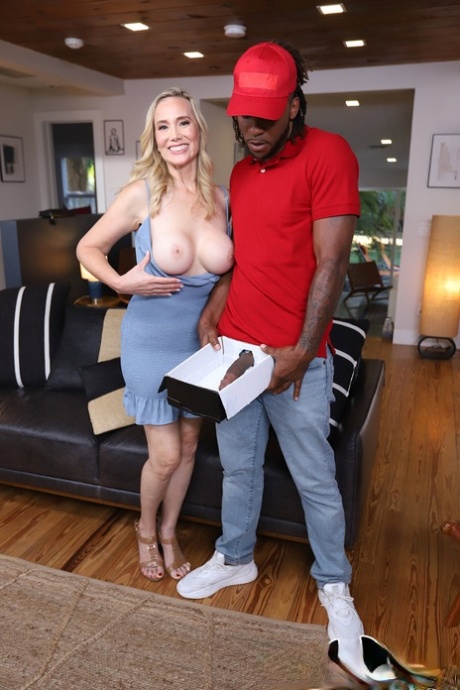 Blonde MILF with big tits Lilly James gets ass fucked by a black delivery guy
