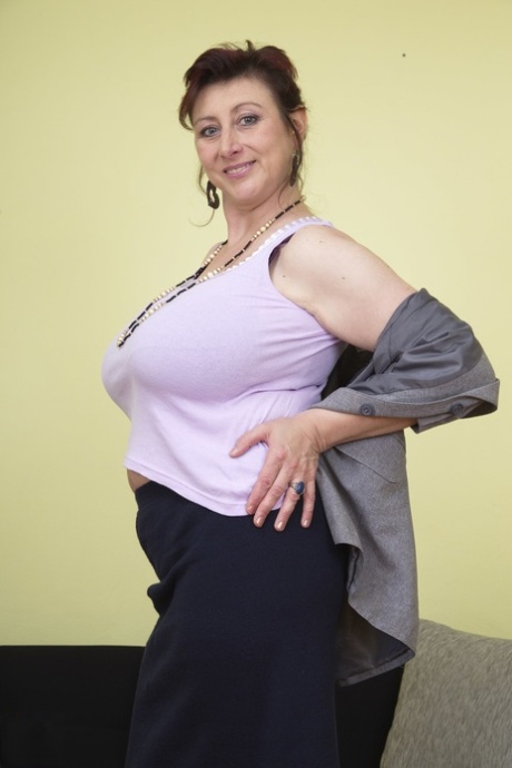 Amateur mature Jana P revels her massive breasts and plays with a toy