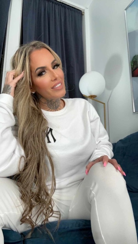 Sexy inked MILF Pamela Kayne flaunts her big tits and ass and seduces a guy