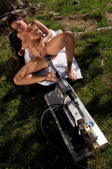 Busty Latina Charley Chase getting fucked by a machine dildo outdoors