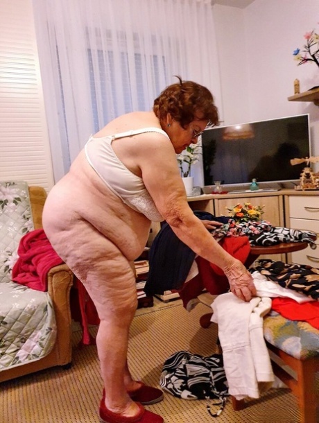 Fat old granny in sunglasses Petljura shows off her body and big tits